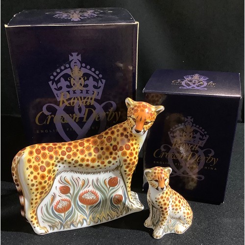 35 - A Royal Crown Derby paperweight, Cheetah, printed mark, gold stopper, boxed;  another, Cheetah Cub, ... 