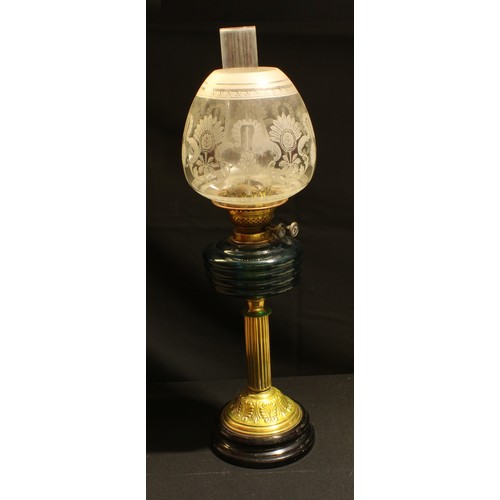 49 - A 19th century columnar oil lamp, glass font, etched glass shade
