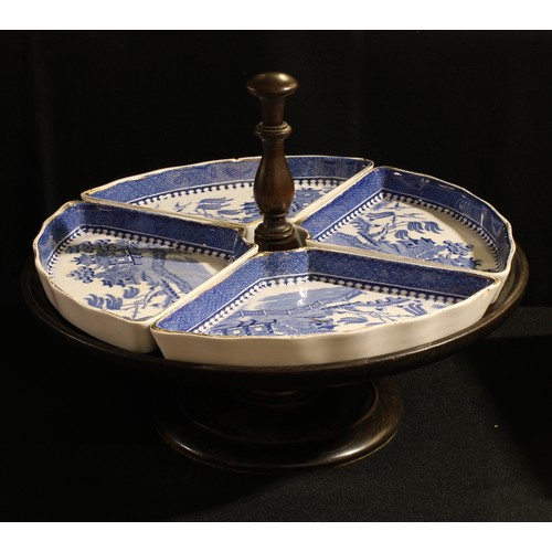 51 - A set of Minton table centre hors d'ouvres dishes, retailed by Waring & Gillow, London, on an oak la... 