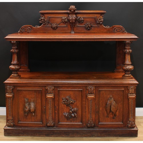 11 - A late Victorian oak two-tier buffet, rectangular top with tall half gallery carved and applied with... 