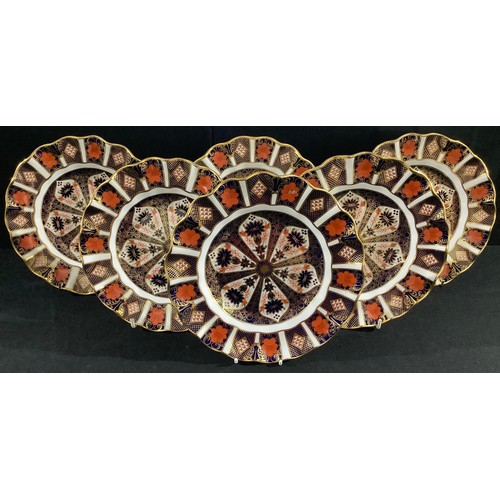 19 - A set of six Royal Crown Derby Imari 1128 pattern shaped circular dessert plates, 22cm, printed mark... 