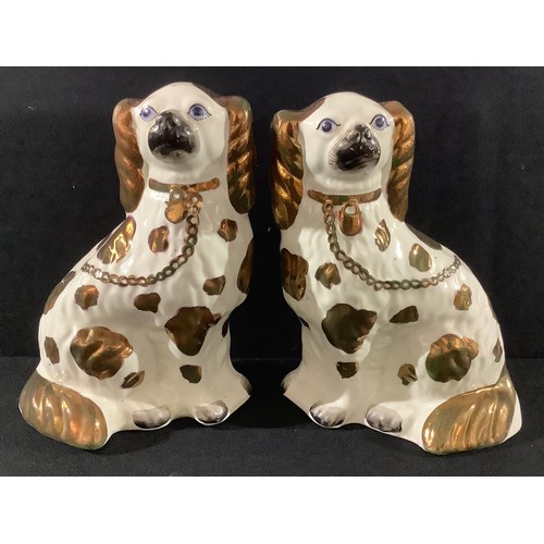 27 - A pair of 19th century Staffordshire King Charles spaniel mantel dogs, copper lustre spots and detai... 