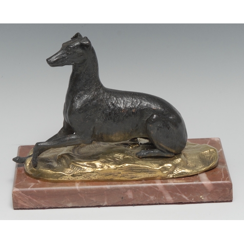 46 - A 19th century dark patinated and parcel gilt desk bronze, of a dog, poised, alert, rectangular marb... 