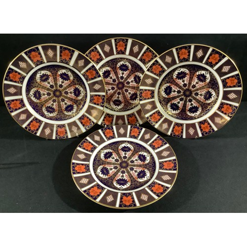 49 - A set of four Royal Crown Derby Imari 1128 pattern dinner plates, 27cm, printed marks, first quality