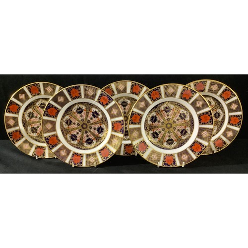 54 - A set of four Royal Crown Derby Imari 1128 pattern side plates, 21.5cm, seconds; another, first qual... 