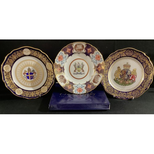 60 - A Royal Crown Derby shaped circular cabinet plate, The Derbyshire Plate, featuring cameos of Haddon ... 
