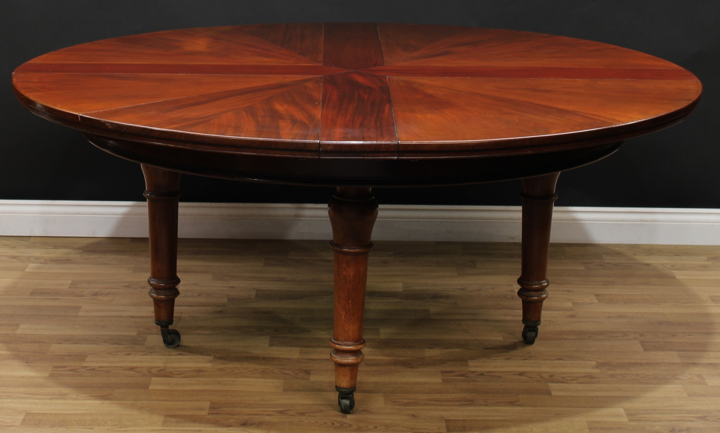 A 19th century mahogany Jupe's patent type radial extending dining table...