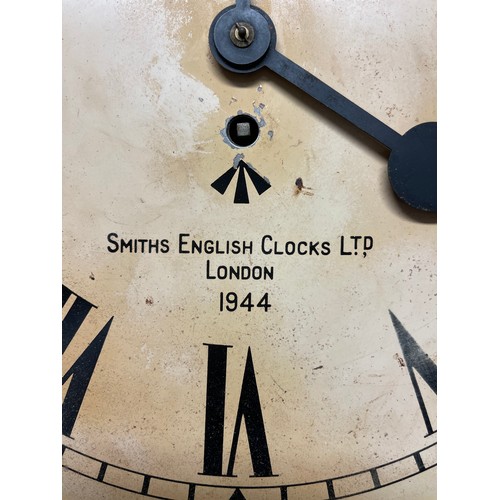 104 - WW2 British WD marked Smith's Bakelite wall clock, dated 1944. 33cm dial. 42cm overall width. Wooden... 