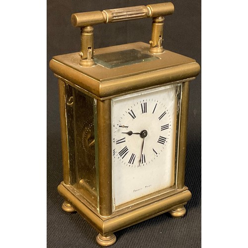 11 - An late 19th/early 20th century French brass carriage timepiece, Roman numerals on white enamel dial... 