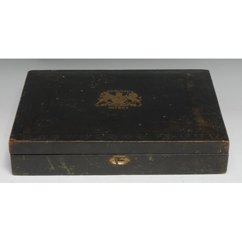 21 - A Victorian gilt and tooled morocco rectangular Patent box, hinged cover, 29cm wide
