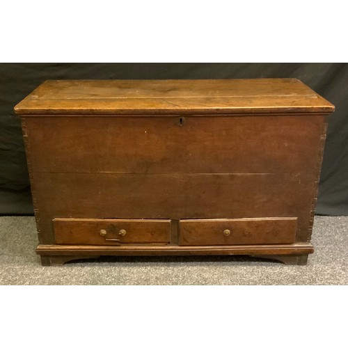 21 - A 19th century oak blanket chest, rectangular hinged top, two small rectangular drawers, bracket fee... 