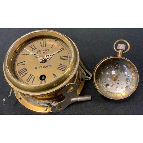 28 - An unusually small Smiths Astral brass cased ships bulkhead clock,  brass dial, bold Roman numerals,... 