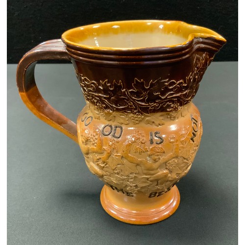 34 - A Doulton Lambeth stoneware jug, in relief with bucolic figures, inscribed  