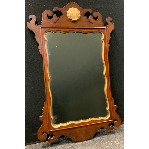 44 - A 19th century Vauxhall type mahogany mirror, with gilt anthemion to cresting, 69cm x 43cm