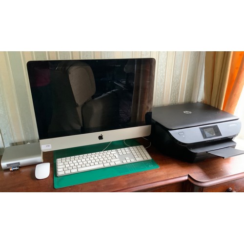 An Apple Mac computer; HP Envy 5640 printer **Please note...