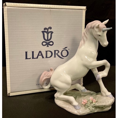18 - A Lladro Privilege model of a Magical Unicorn, number 7697, 22cm, printed and impressed marks, dated... 