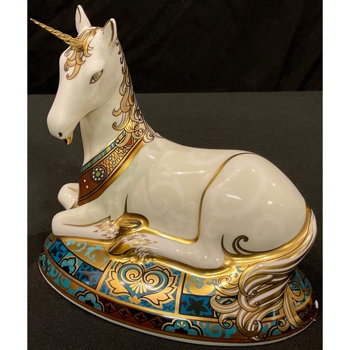 20 - A Royal Crown Derby paperweight, Unicorn, designed by Louise Adams to celebrate the New Millennium, ... 