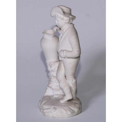 15 - A Rockingham biscuit figure, of a boy with a broken pitcher, resting on a rocky mound, 14cm high, in... 