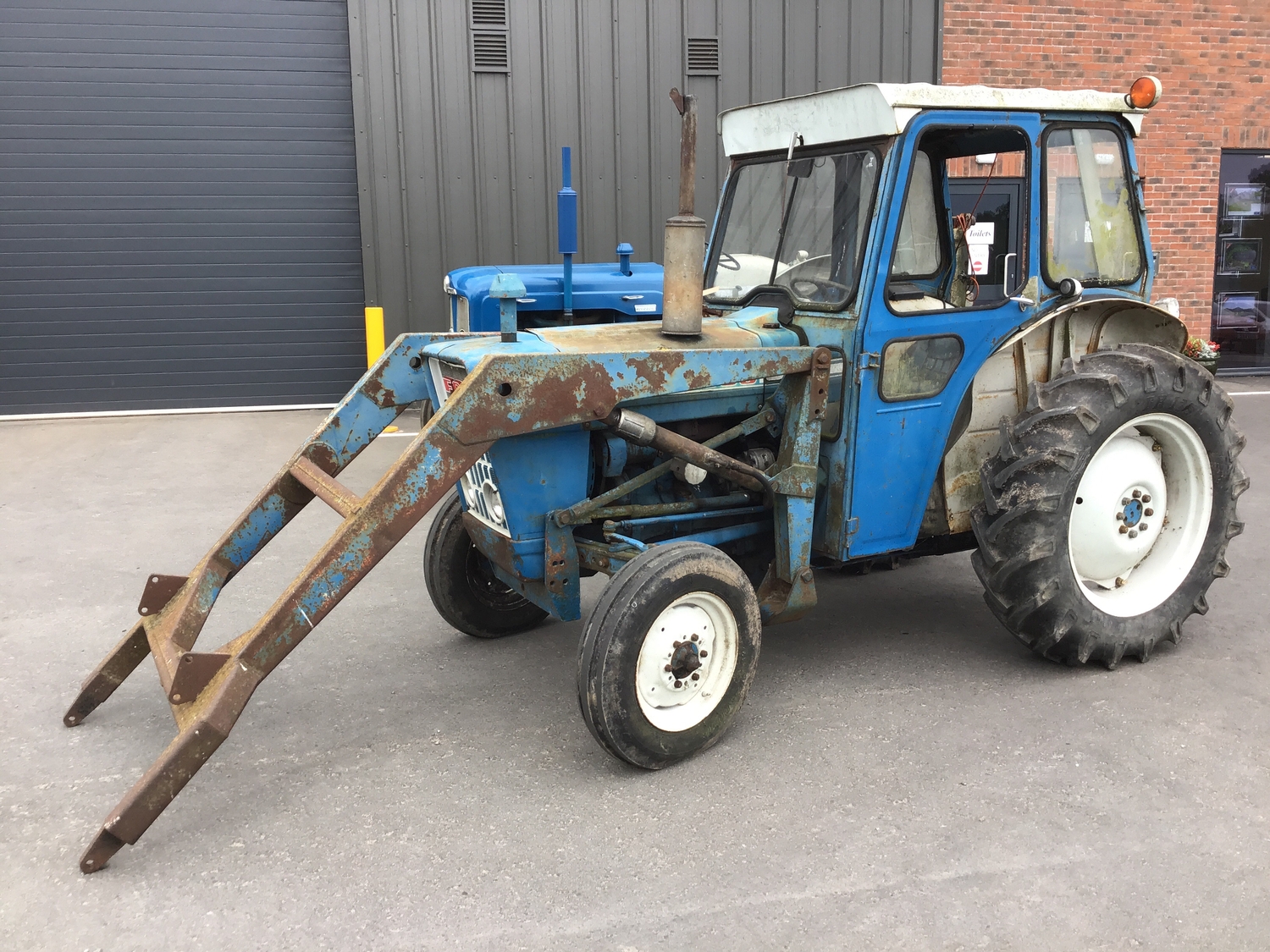 Ford 3000 tractor with loader, starts and runs well. Low hours