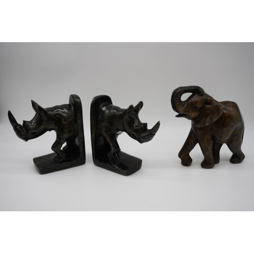 461 - Pair of granite rhinoceros books ends and granite elephant