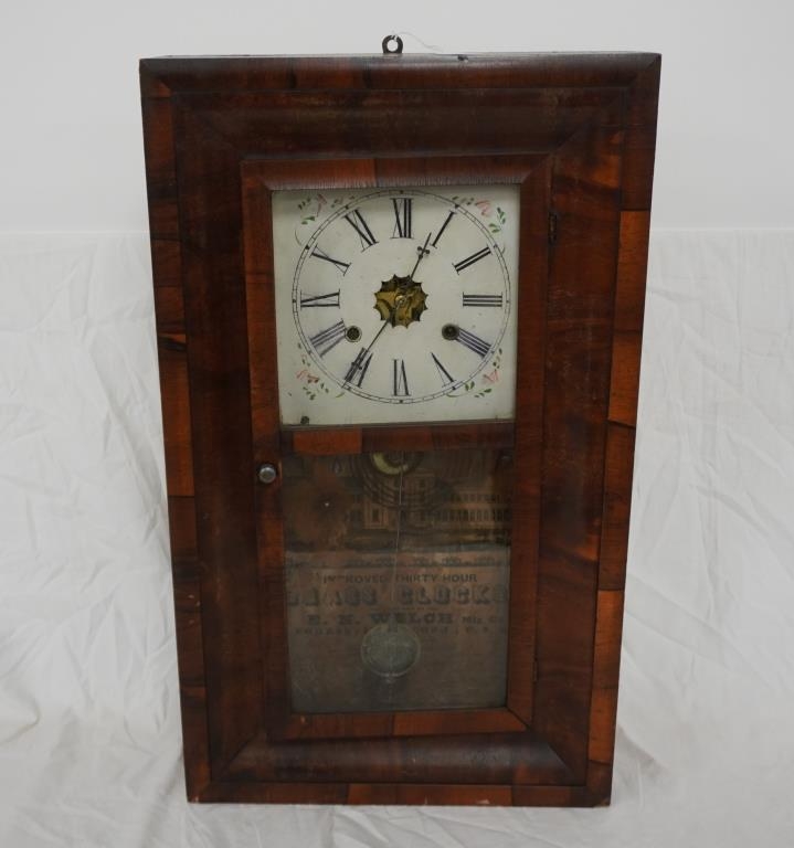 Improved thirty hour brass clock by E.N. Welch