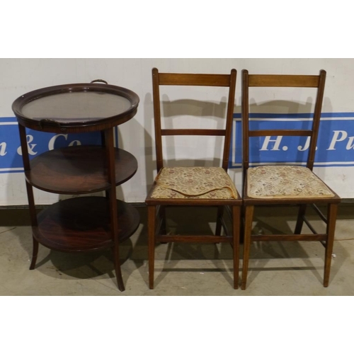 54 - 2 Mahogany hall chairs and mahogany circular serving table with glass tray