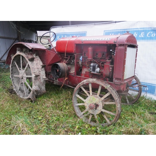 32 - International W30 tractor on iron wheels. Starts and runs. Barn stored, quite original, SN. WB30662