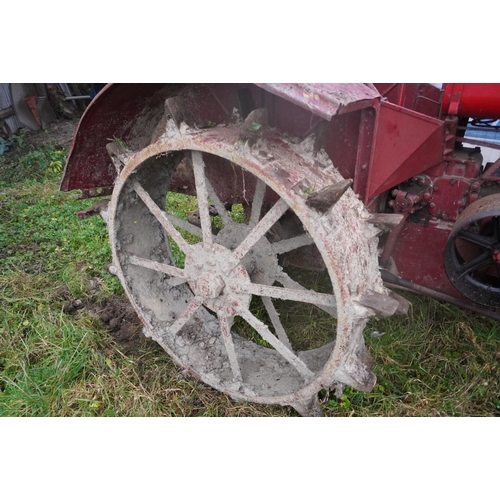 32 - International W30 tractor on iron wheels. Starts and runs. Barn stored, quite original, SN. WB30662