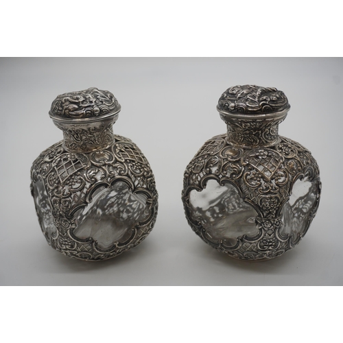 Pair of William Comyns large late victorian glass perfume bottles in solid silver pierced frame 12cm high