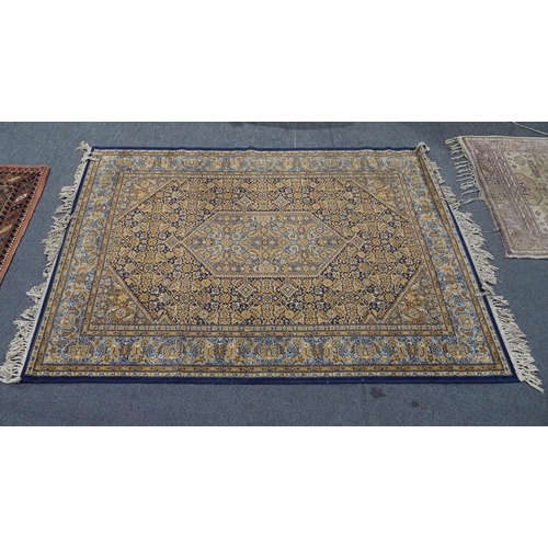 10 - Blue and gold patterned wool rug 77x55