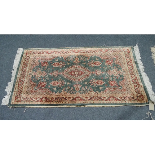 24 - Green and red patterned wool rug 62x42