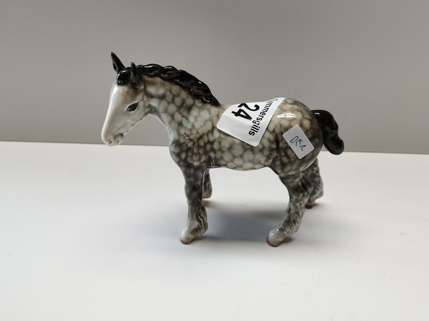 Small Beswick shire foal in rocking horse grey