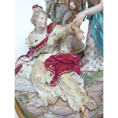 1 - A late 19th Century Meissen figure group depicting a fallen female figure wearing a crown, above her... 