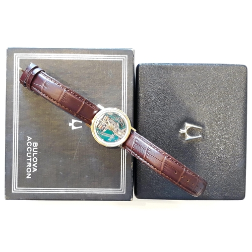 169 - A 1960s gold plated Bulova Accutron wrist watch, diam. 35mm, marked '40 SAD' with original box, book... 