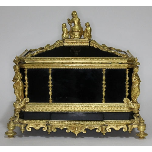20 - A French 19th century gilt metal and ebonised casket having figural finial and columns, scroll work ... 