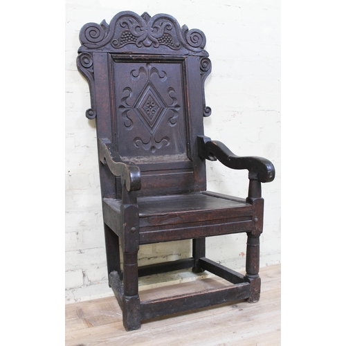 8 - A 17th century oak Wainscot armchair, width 57cm, depth 53cm & height 120cm.