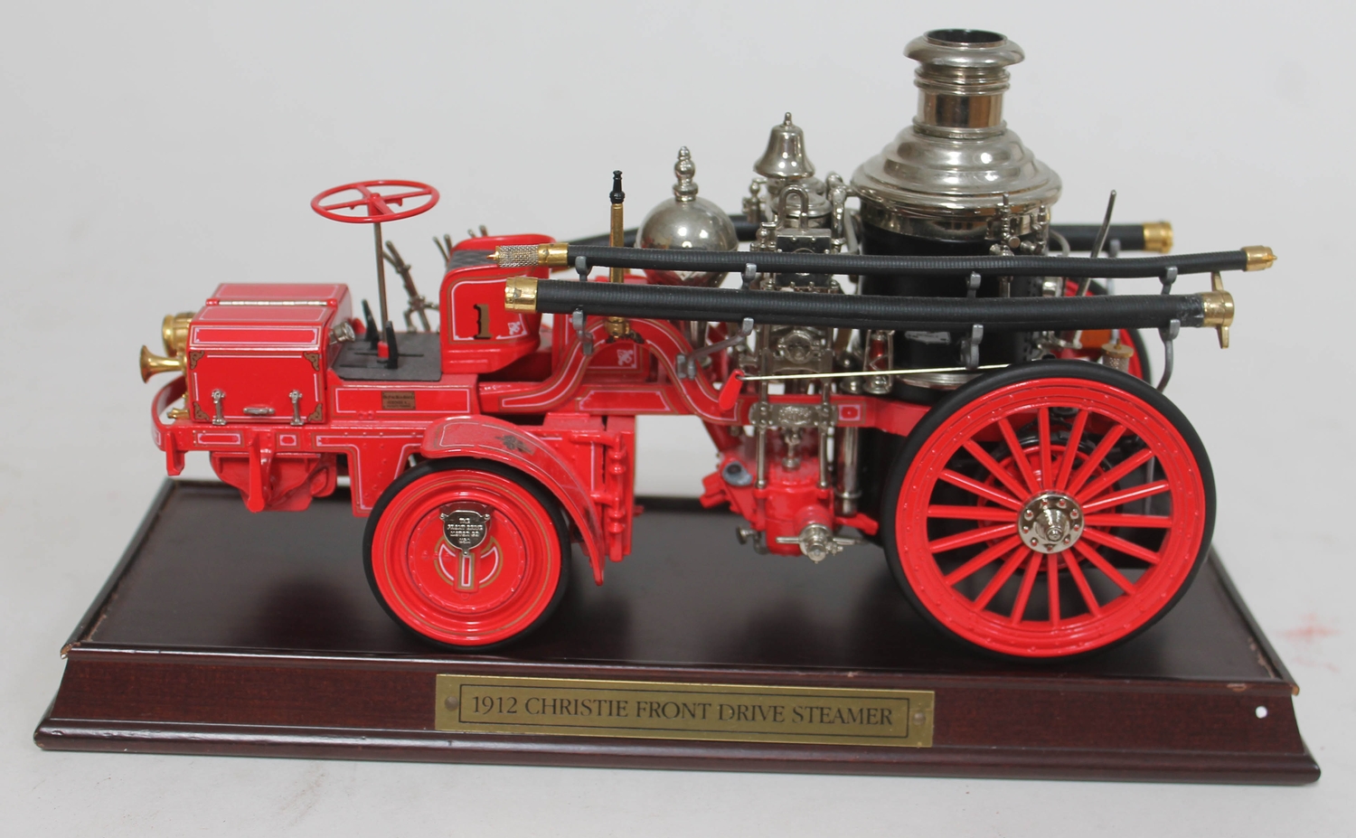 A Franklin Mint 1912 Christie Front Drive Steamer fire engine model on ...