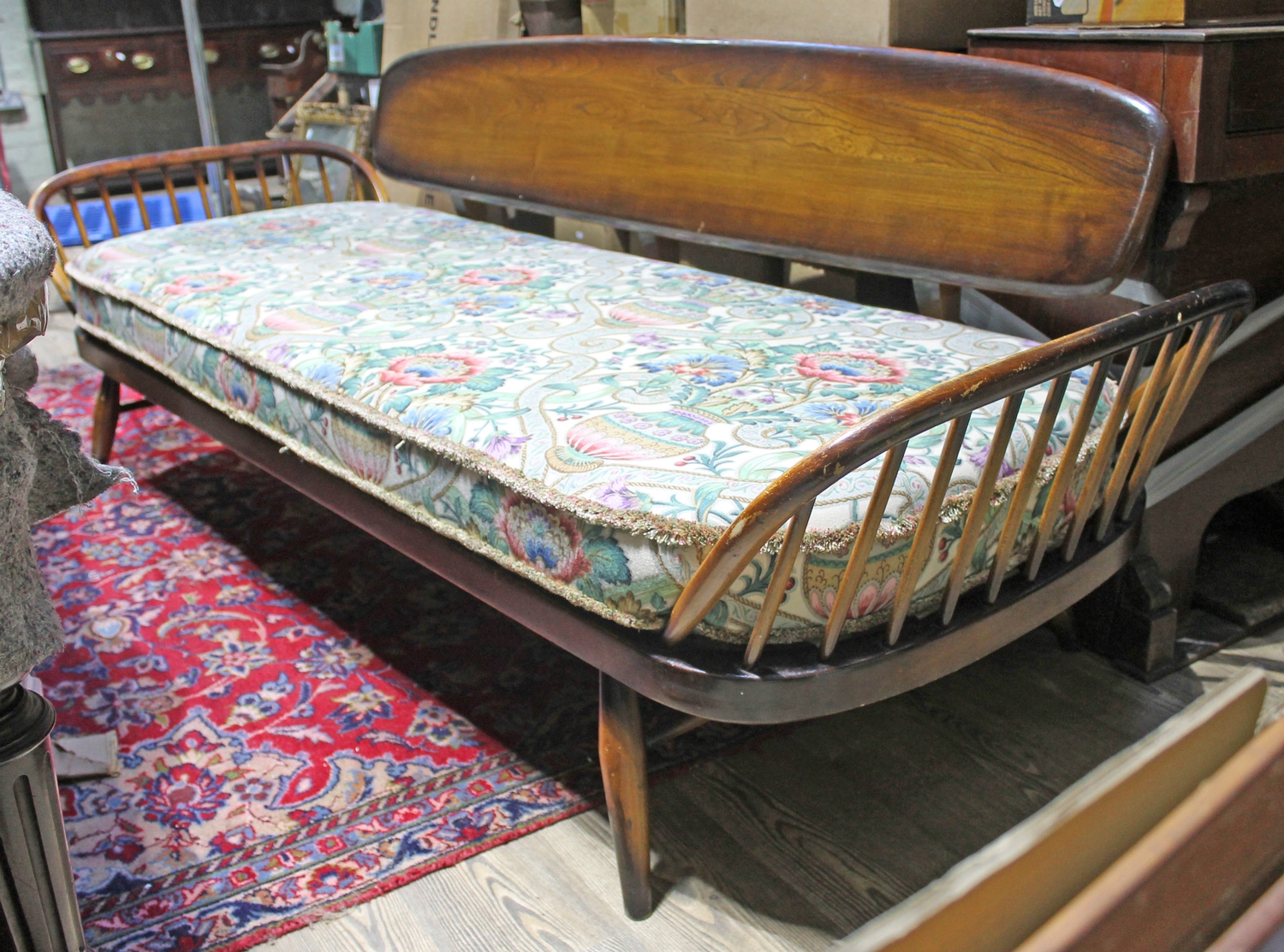 An Ercol three seater studio day bed.
