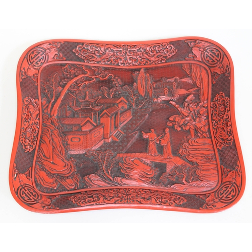 375 - A Chinese cinnabar lacquer dish or tray, 36cm x 30cm.