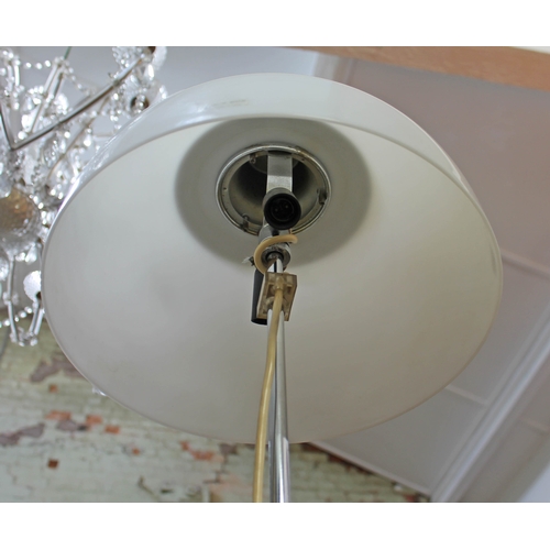 43 - A mid 20th century retro Harvey Guzzini chrome floor standing lamp with adjustable white plastic mus... 