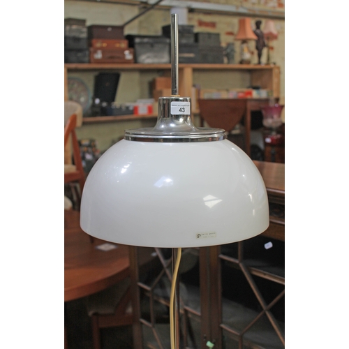 43 - A mid 20th century retro Harvey Guzzini chrome floor standing lamp with adjustable white plastic mus... 