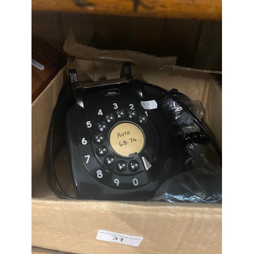 31 - Vintage black telephone
