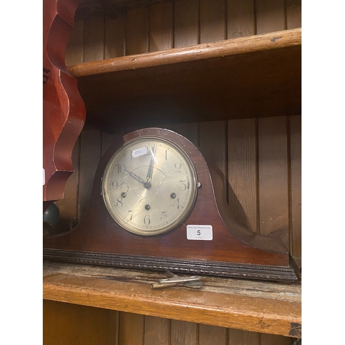 5 - A mantel clock with key.