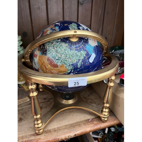 25 - A semi-precious terrestrial globe on brass stand.