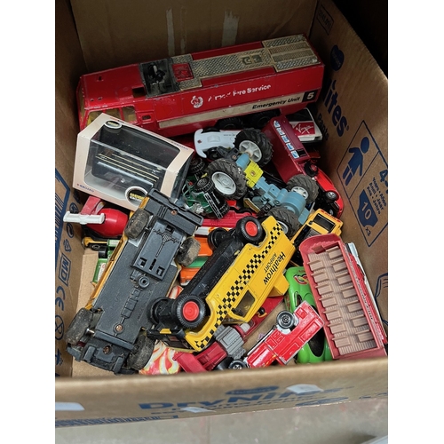 38 - A box of die-cast vehicles.