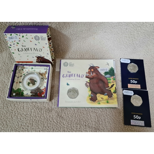21 - A Gruffalo 20 year anniversary 50p, a Gruffalo and mouse 2019 UK 50p silver proof coin and two other... 