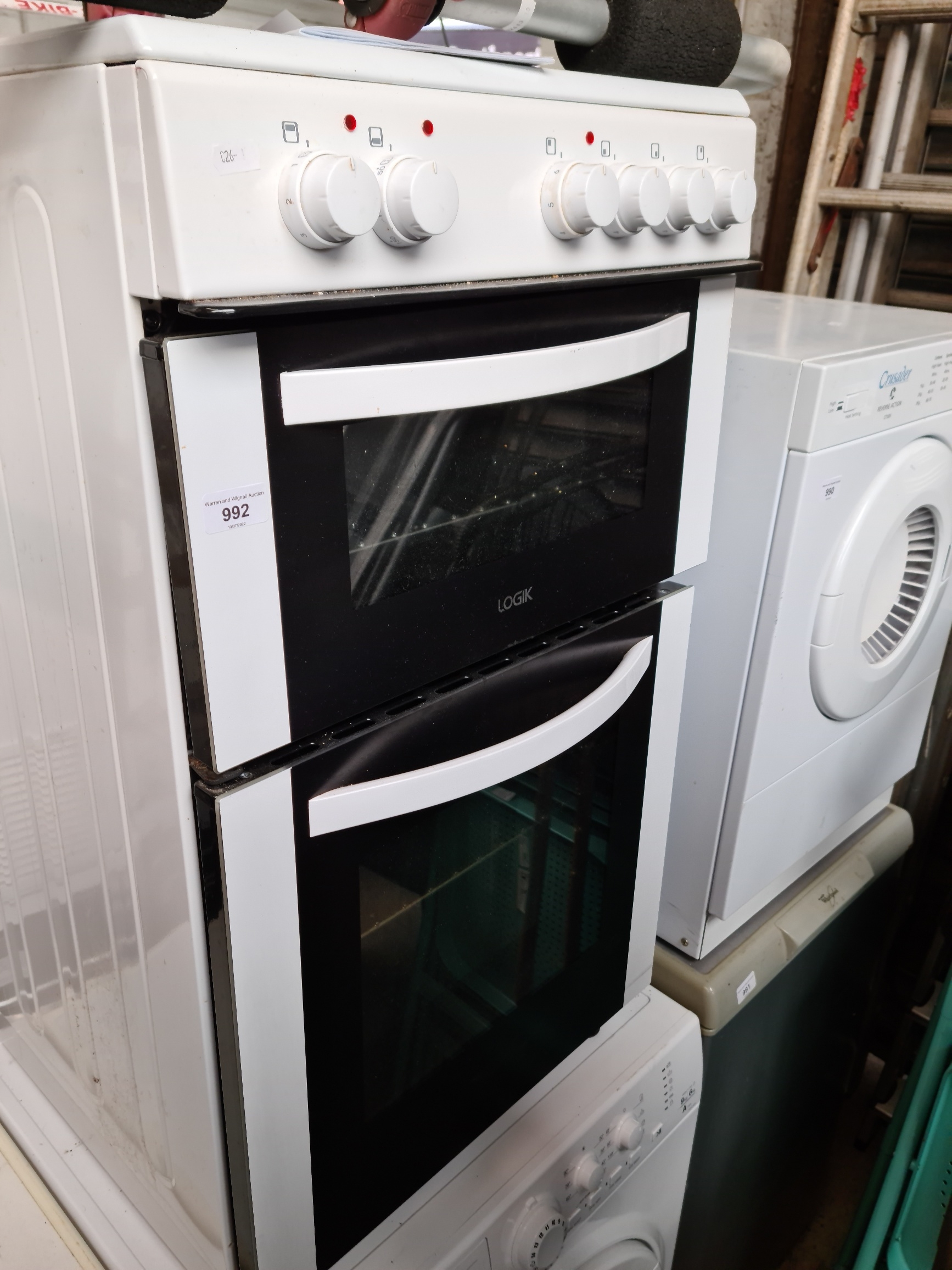 A Logik free standing twin cavity electric cooker LFTC50W16