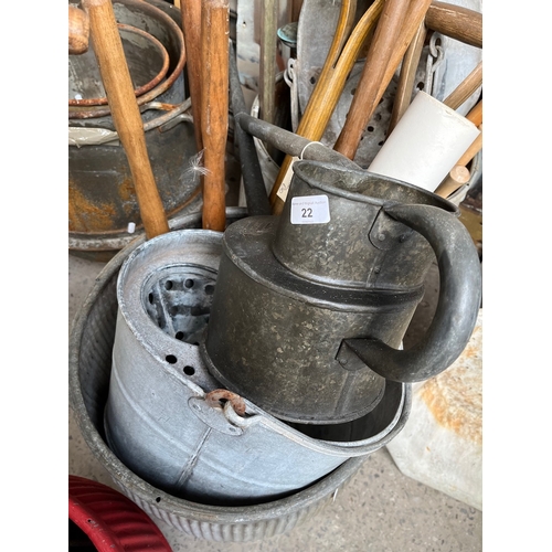 22 - Long reach galvanised watering can, a galvanised mop bucket and a selection of garden tools, spade, ... 