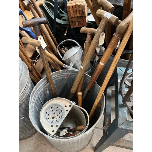 41 - A galvanised mop bucket, a garden hand forks, shears, 4 garden forks.