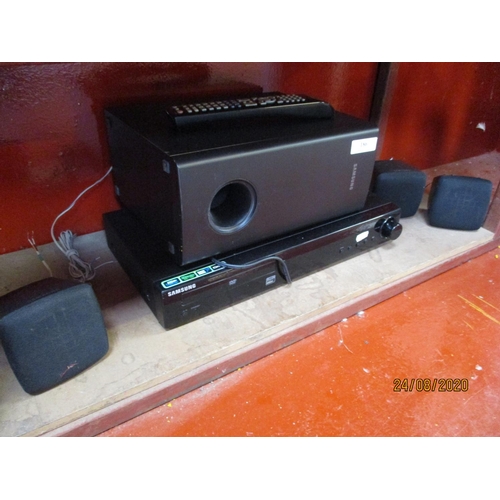 A Samsung DVD player and surround sound system